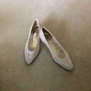 Goddess white lace pumps